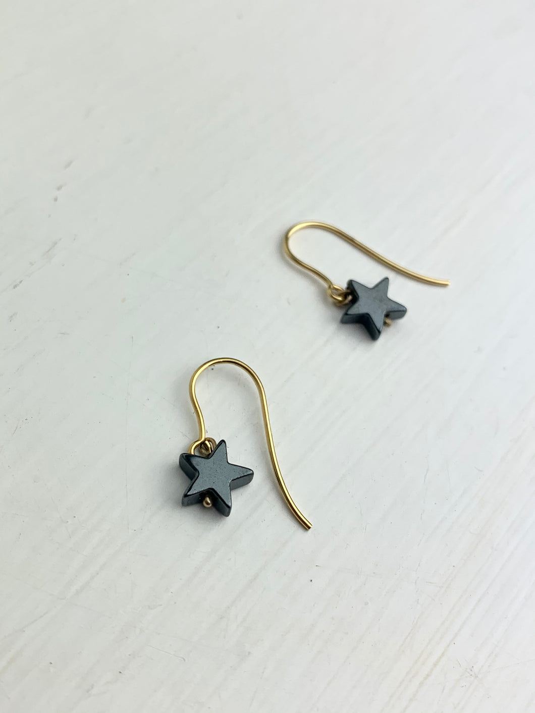Hematite Star Earrings in Gold